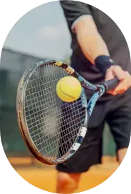 a tennis player hitting a ball with a racket