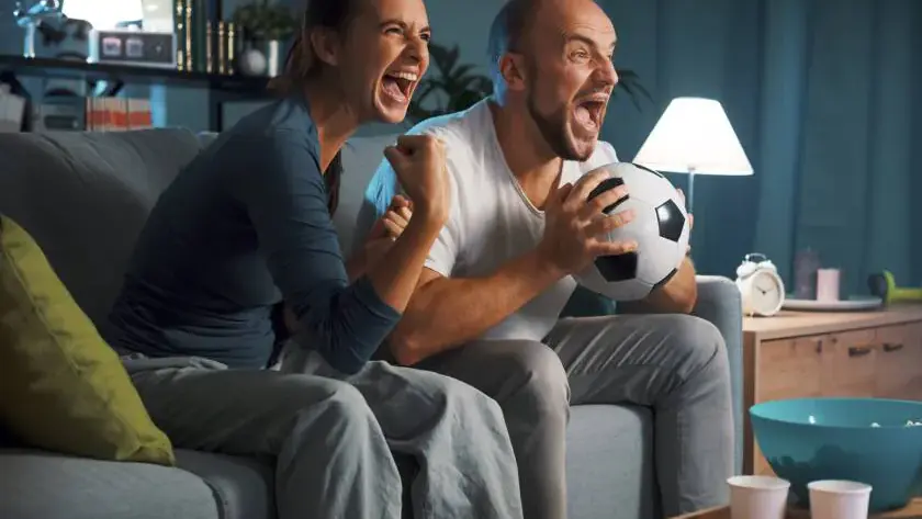 Couple excited, watching Sports - Flix Live TV